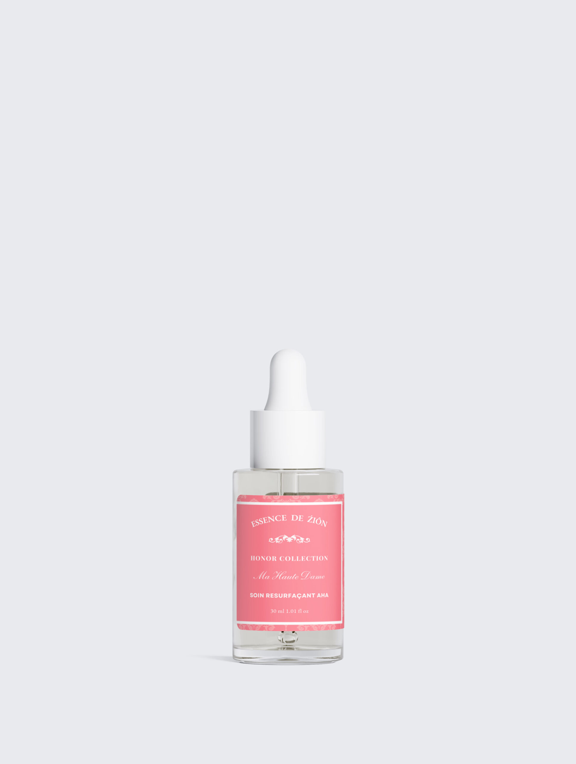 Soin Resurfaçant AHA AHA Resurfacing Treatment by ESSENCE DE ŹI̯ÔN in a clear luxury dropper bottle with a white cap.
